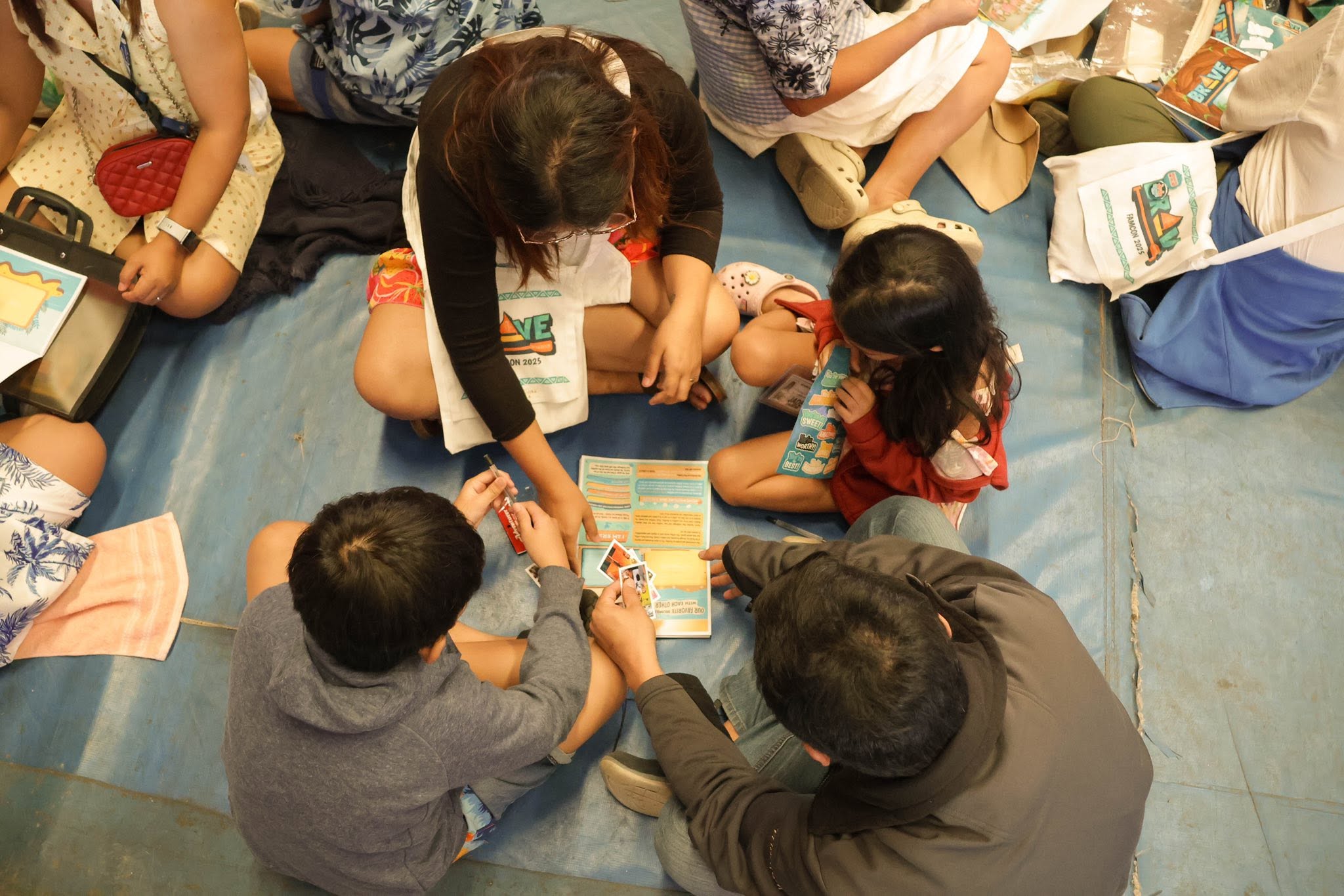 Kids sharing blessings and gifts in a community charity activity